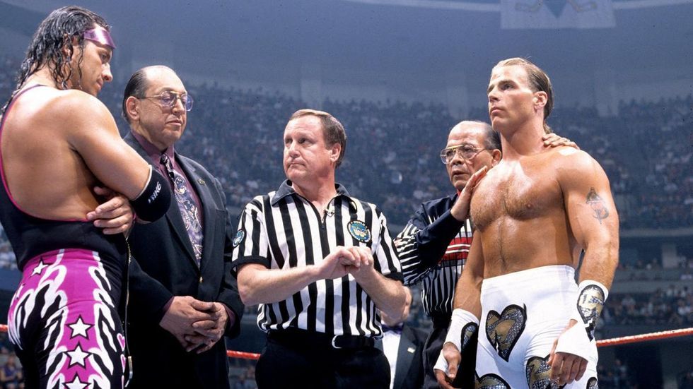 Bret Hart and Shawn Michaels facing off in the ring