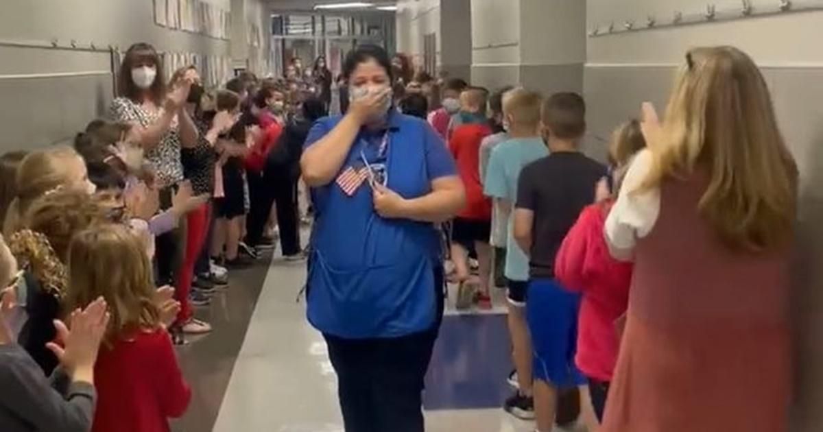 Heartwarming video shows students celebrating their cafeteria manager for becoming a citizen