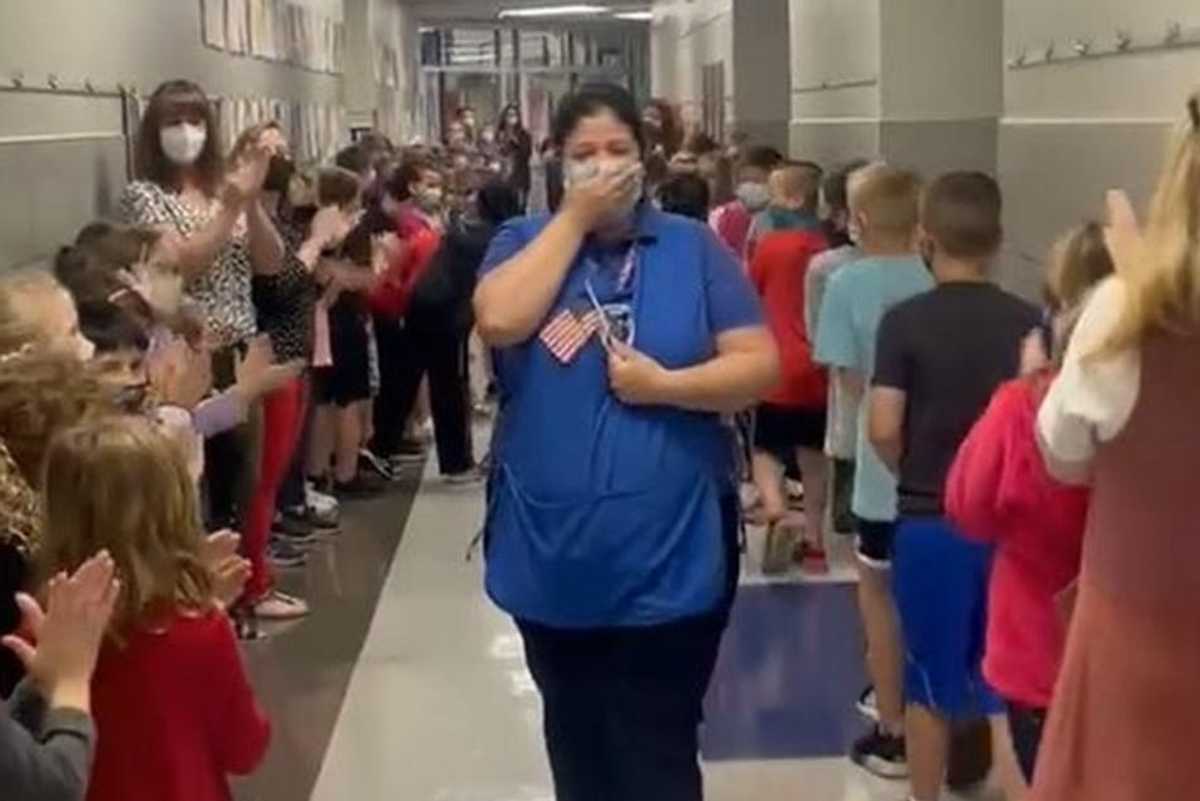 Heartwarming video shows students celebrating their cafeteria manager for becoming a citizen