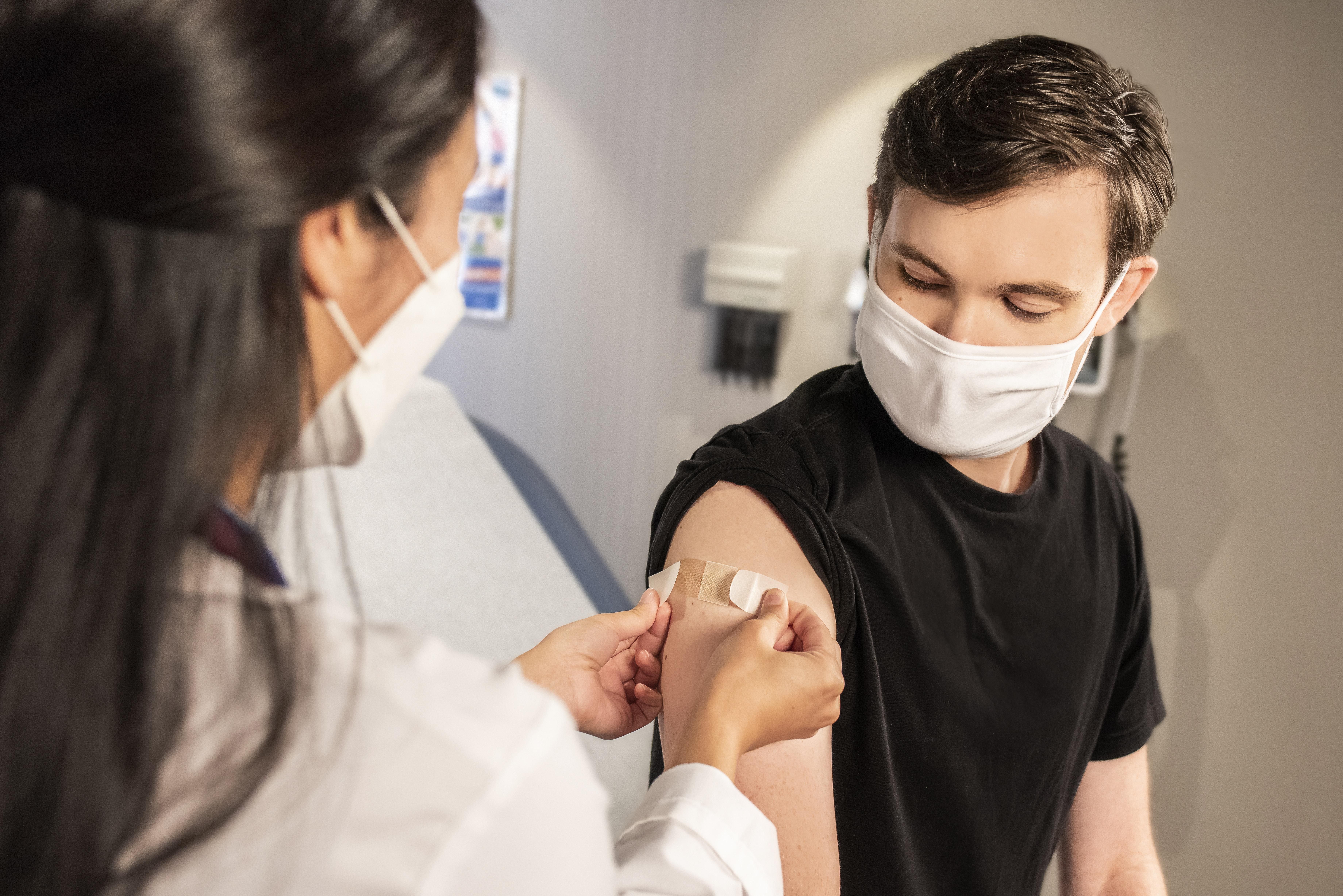 A man receiving the Covid-19 vaccine 