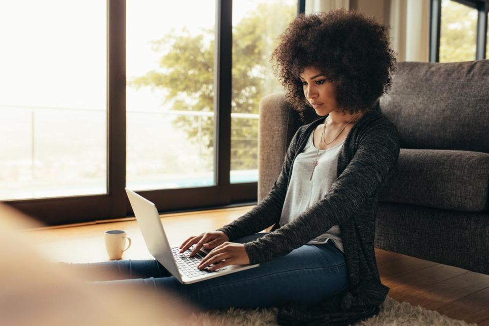 young-black-woman-afro-laptop