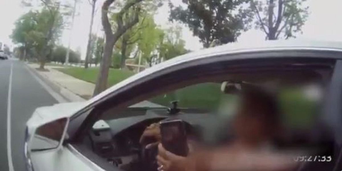 Watch: Teacher goes on racist rant against deputy who pulls her over, repeatedly calling him 'a murderer'