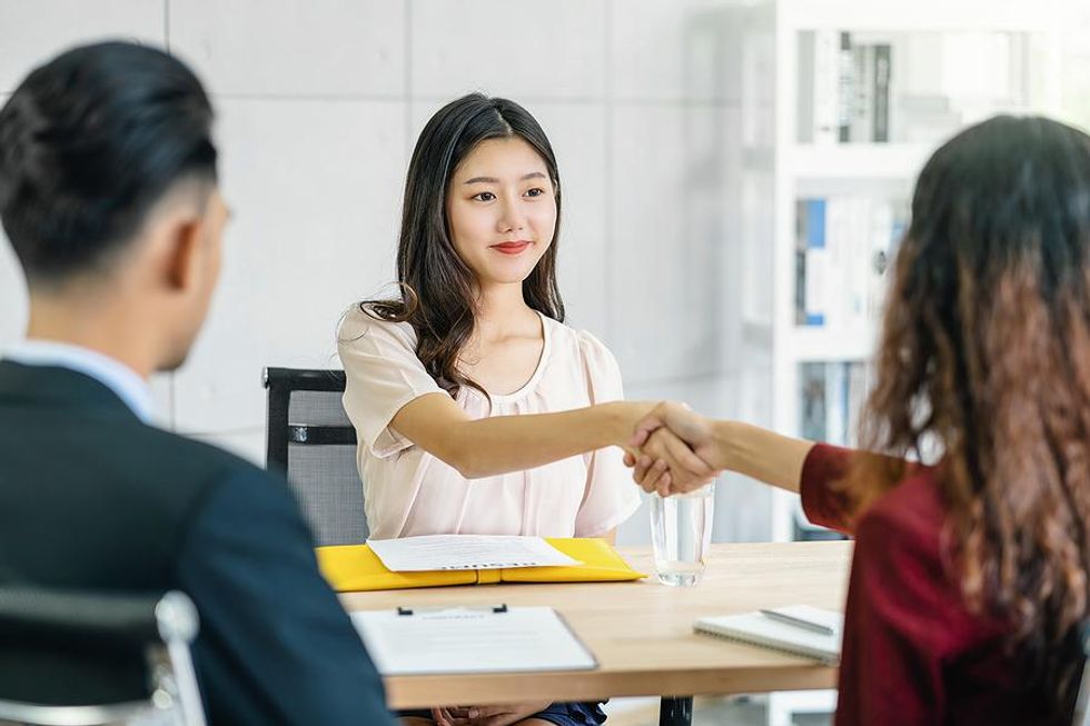 Woman accepts a job offer during an interview