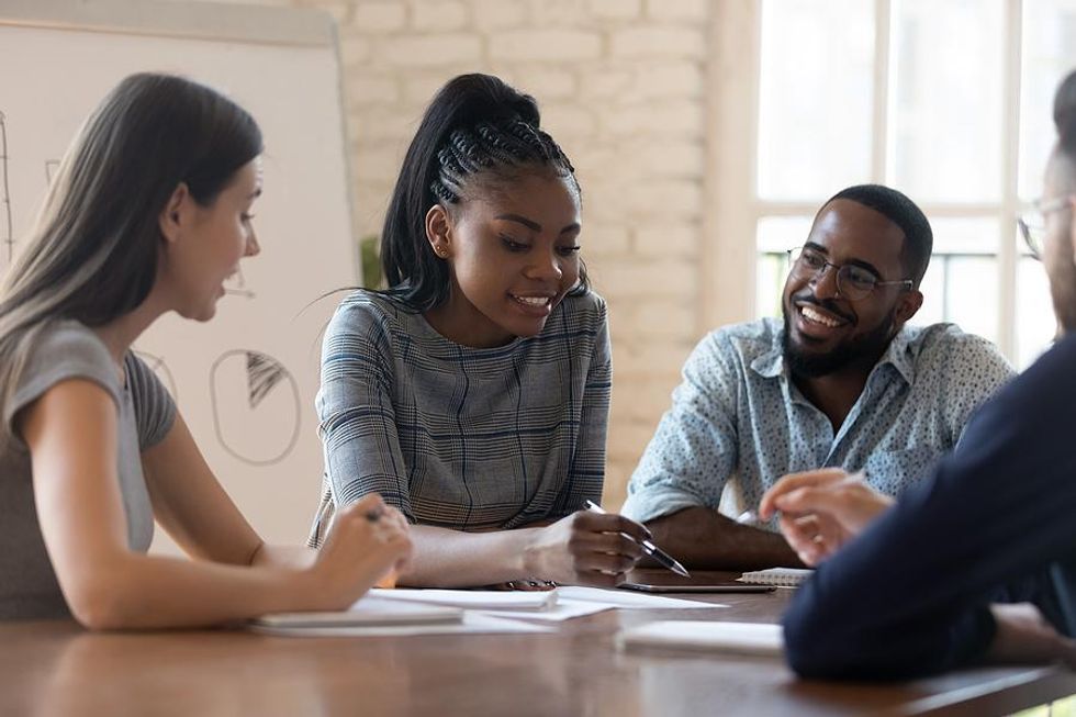 Woman leads her team at work