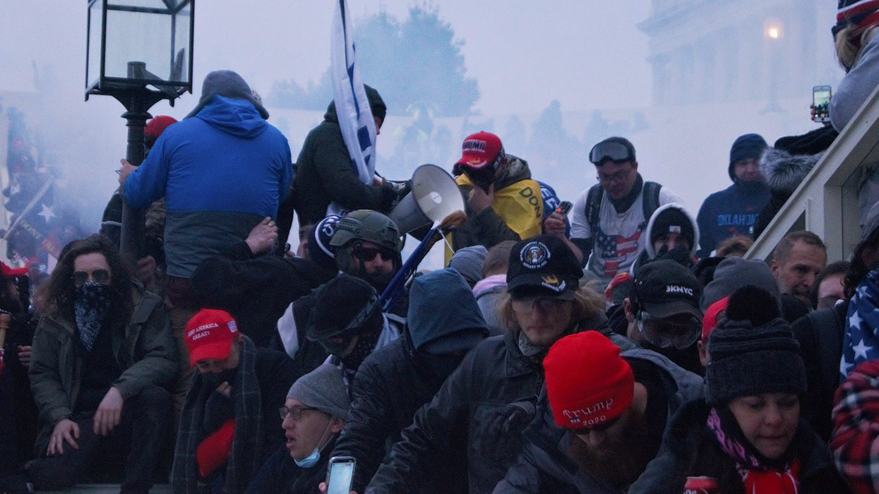 Pro-Trump mob storming the Capitol on January 6, 2021. 