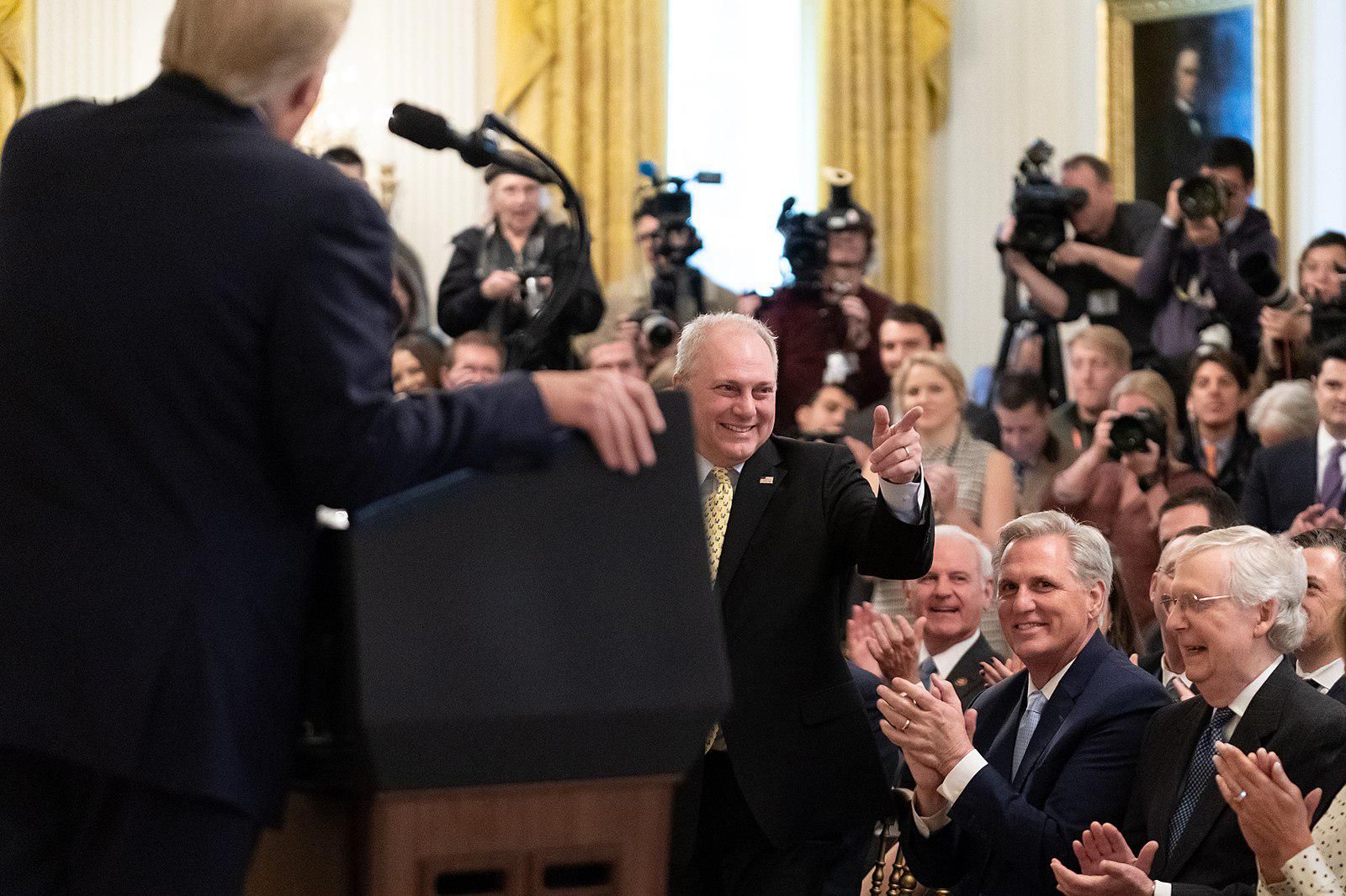 Former President Trump recognizing Rep. Steve Scalise, center, at the White House with House Minority Leader Kevin McCarthy and Senate Minority Leader Mitch McConnell, right.
