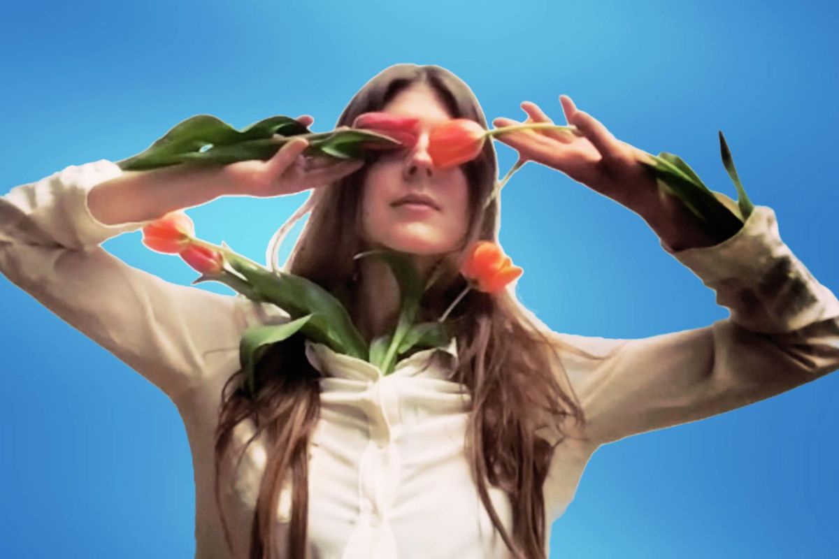 Canadian singer-songwriter, composer, and producer Lydia Ainsworth poses for a floral photo shoot.