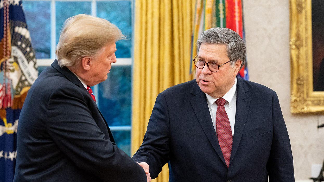 Former Attorney General Bill Barr, right, shaking hands with former President Trump. 