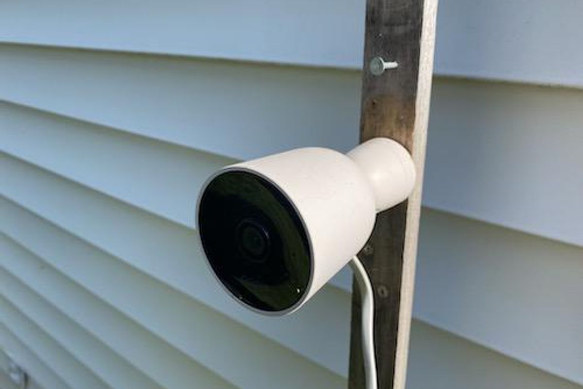 Nooie Outdoor smart security camera installed on a house