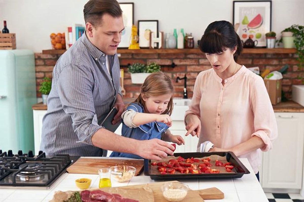 Family making a HelloFresh meal