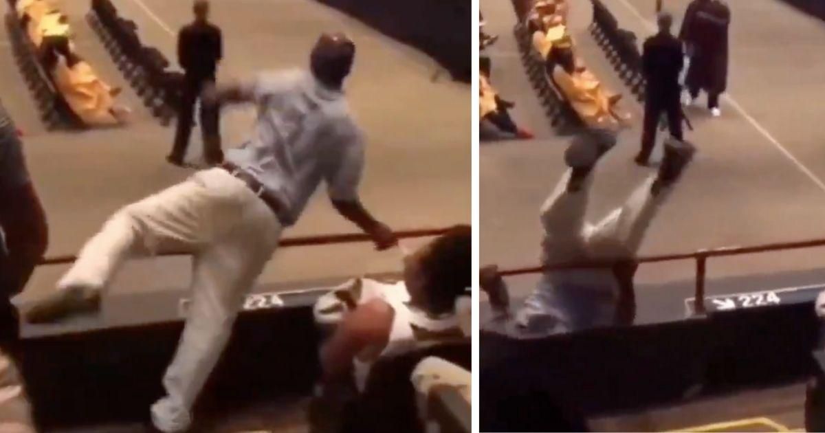 Dad delights crowd with a literally over-the-top celebration at his kid's graduation