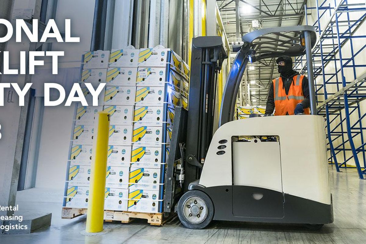 penske associate driving forklift in warehouse