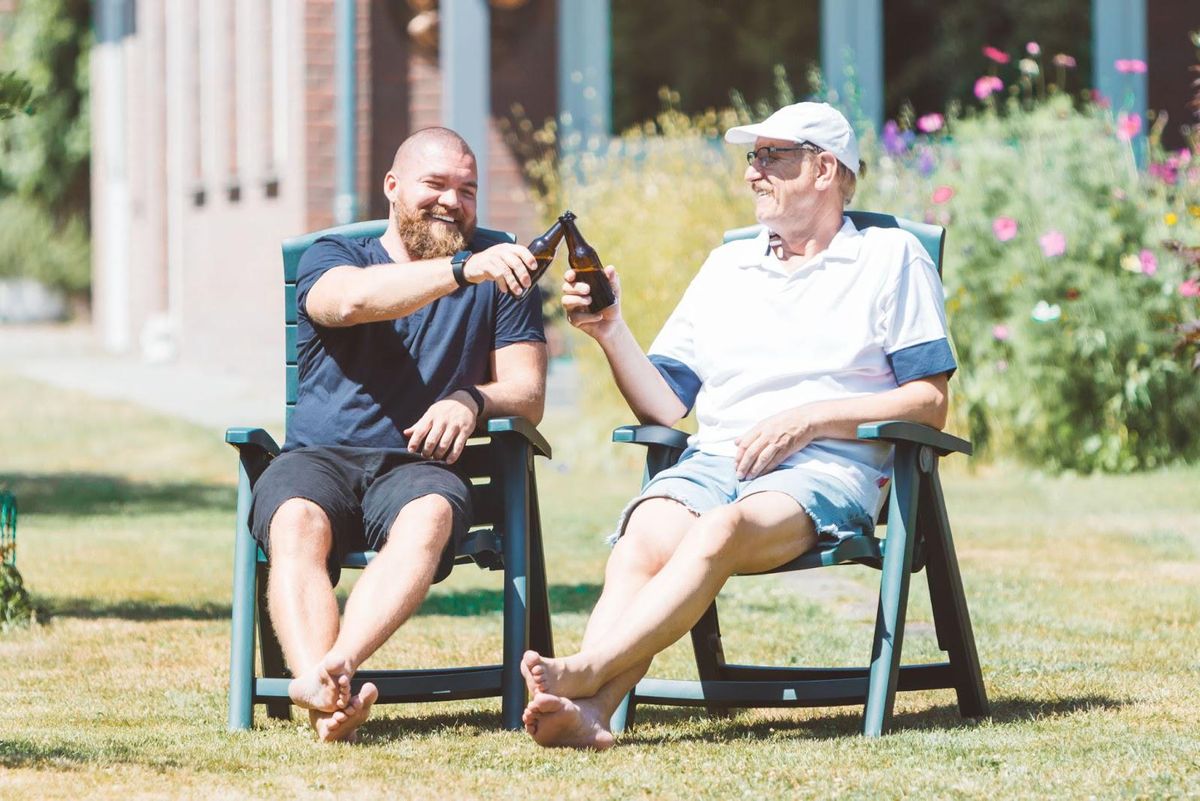 two men drinking beer