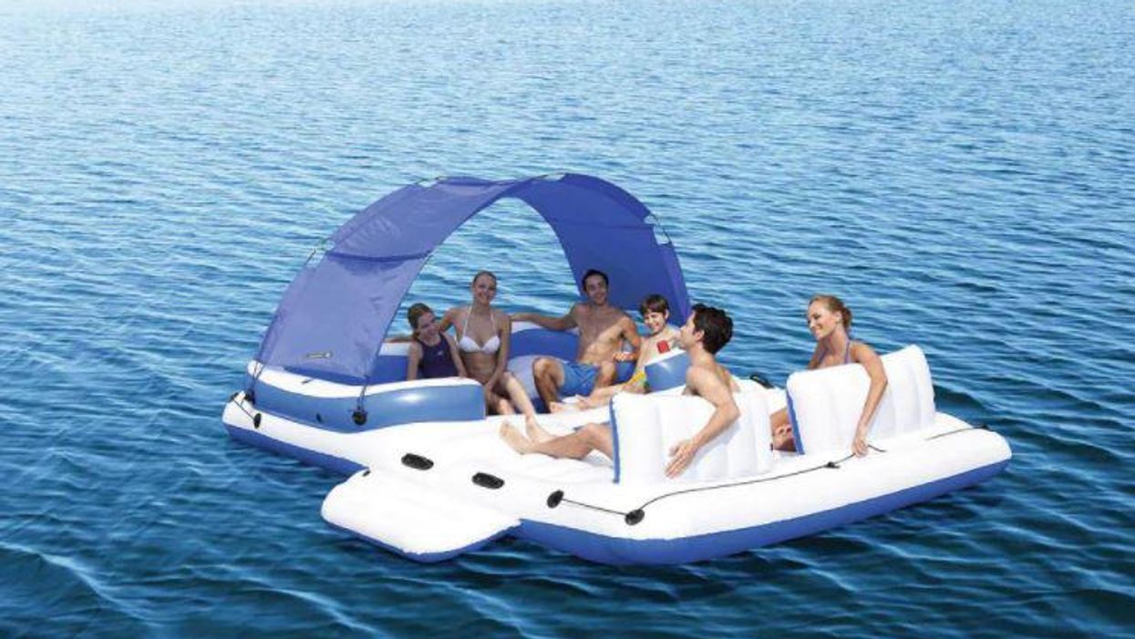 This floating island raft has everything you need for a perfect day at the lake