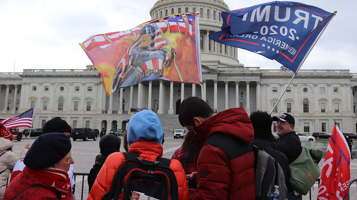 Trump flags wave on the morning of the January 6 pro-Trump Capitol insurrection.