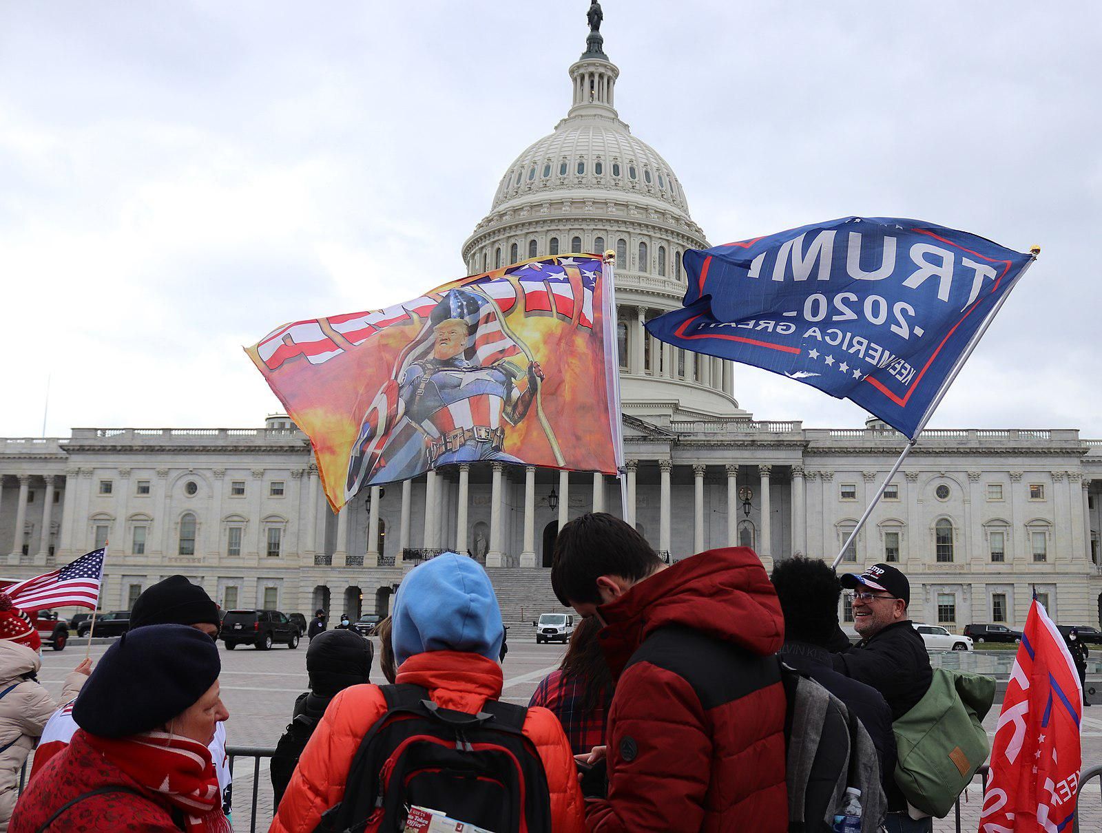 Trump flags wave on the morning of the January 6 pro-Trump Capitol insurrection.