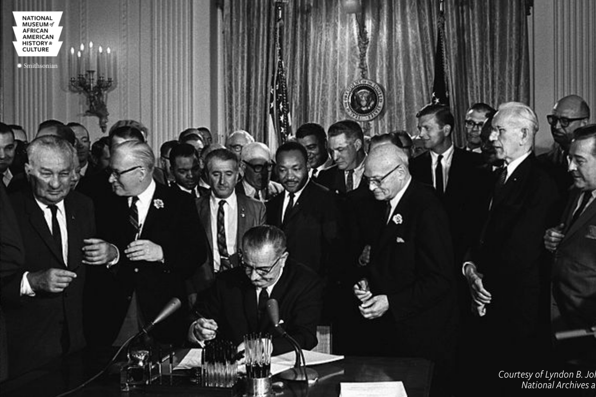 LBJ signing the Civil Rights Act