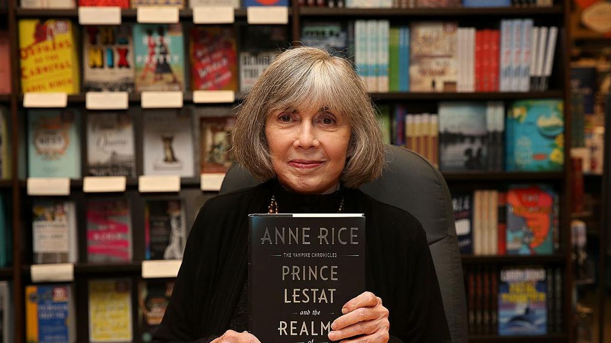 Anne Rice holds a copy of "Prince Lestat and the Realms of Atlantis"