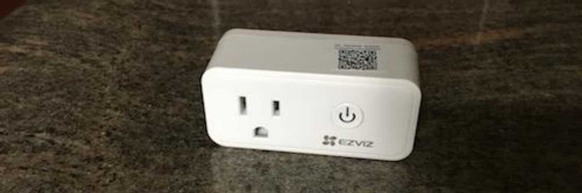 Front side of EZVIZ Smart Plug on a countertop[