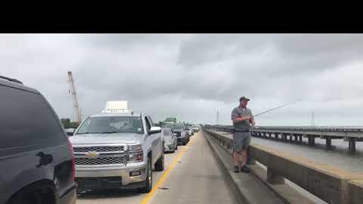 A man went fishing while stuck in a five-hour traffic jam on a New Orleans bridge