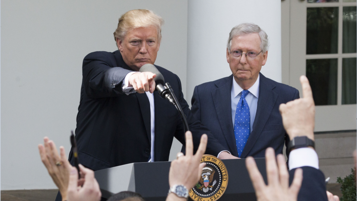 Senate Minority Leader Mitch McConnell, right, and former President Trump. 