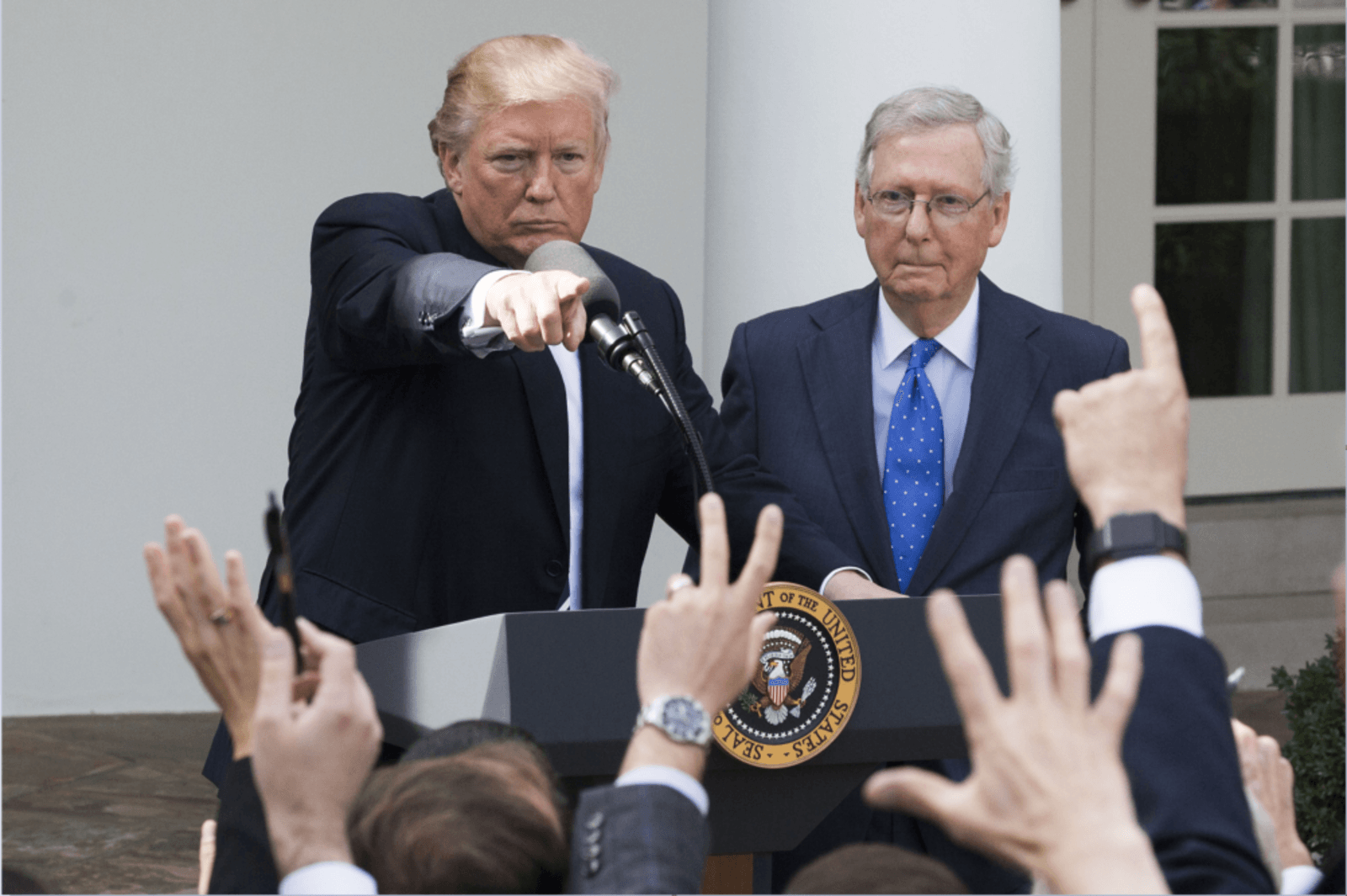 Senate Minority Leader Mitch McConnell, right, and former President Trump. 