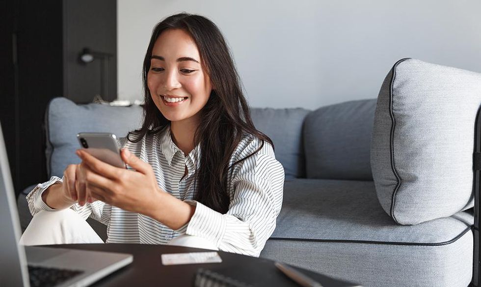 Woman works a remote social media job