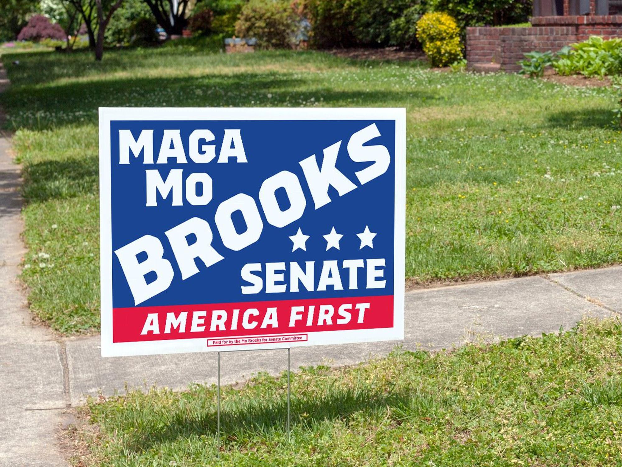 A 'MAGA Mo' campaign sign.