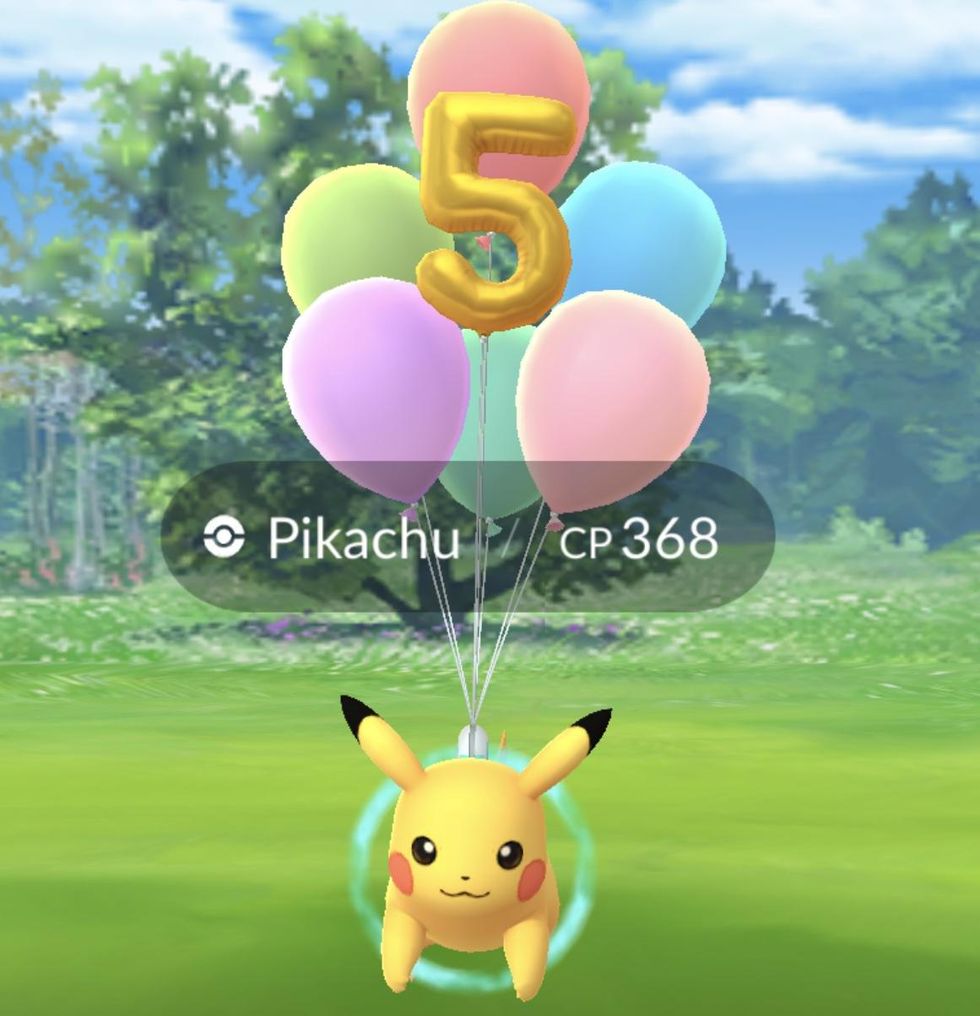 Flying Pikachu with five balloons