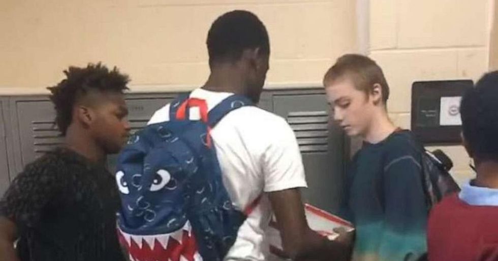 High schooler mocked for wearing the same clothes every day surprised by football players