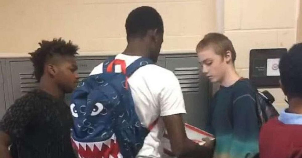 High schooler mocked for wearing the same clothes every day surprised by football players