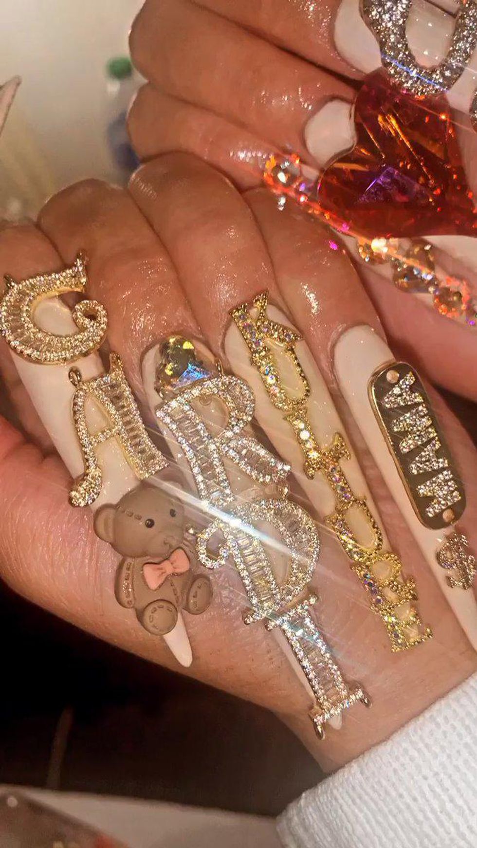 The Story Behind Cardi B's Crystal Acrylic Nails at The 2018