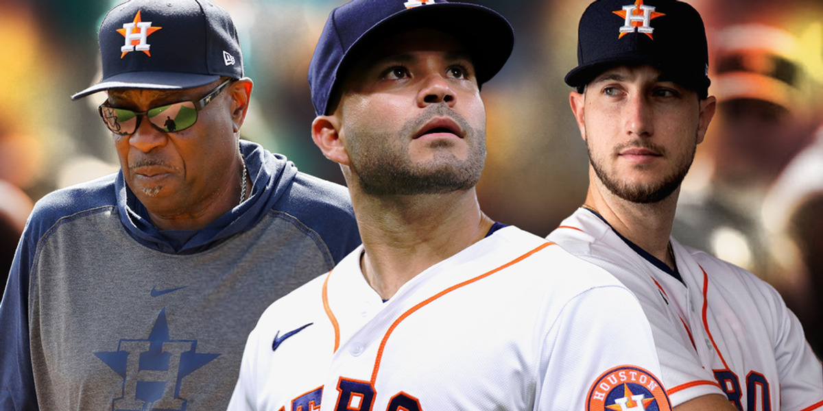 Houston Astros' Lance Berkman walks back to the dugout after