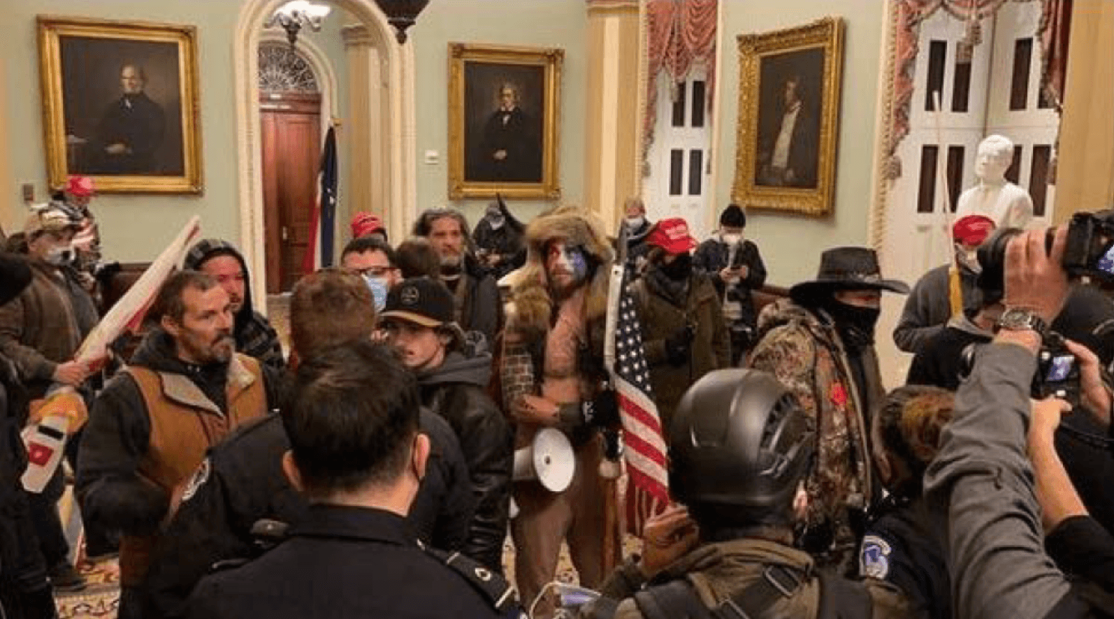 Jacob Chansley, or the "QAnon Shaman," during the January 6 Capitol riot. 