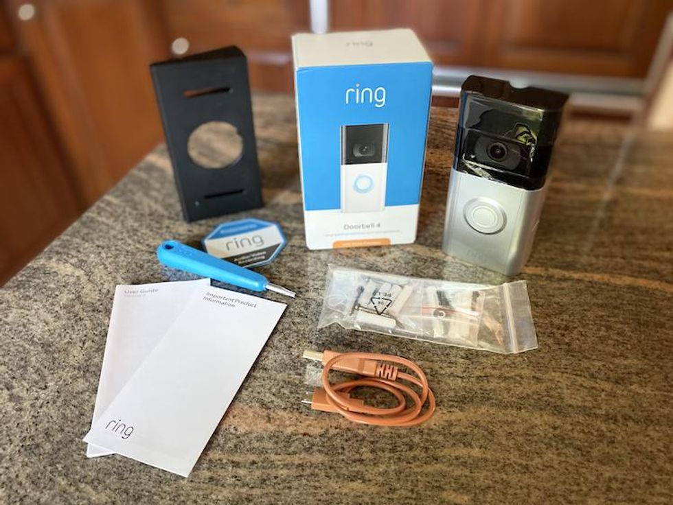 Contents of Ring Video Doorbell 4 on a countertop