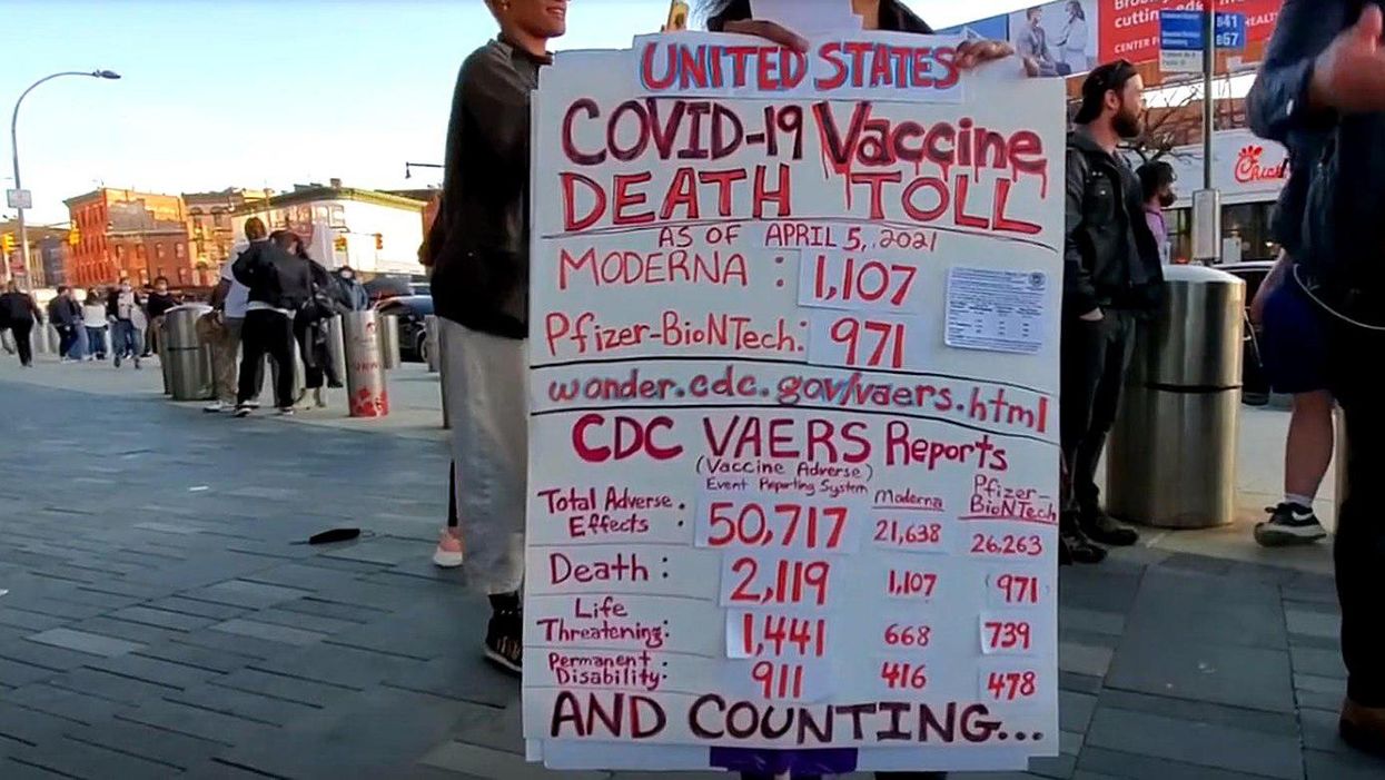 Demonstrator uses unverified VAERS data to protest the COVID-19 vaccine.