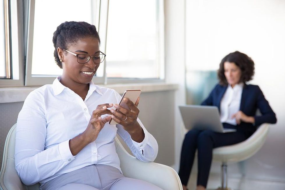 Professional woman invites someone to connect on LinkedIn