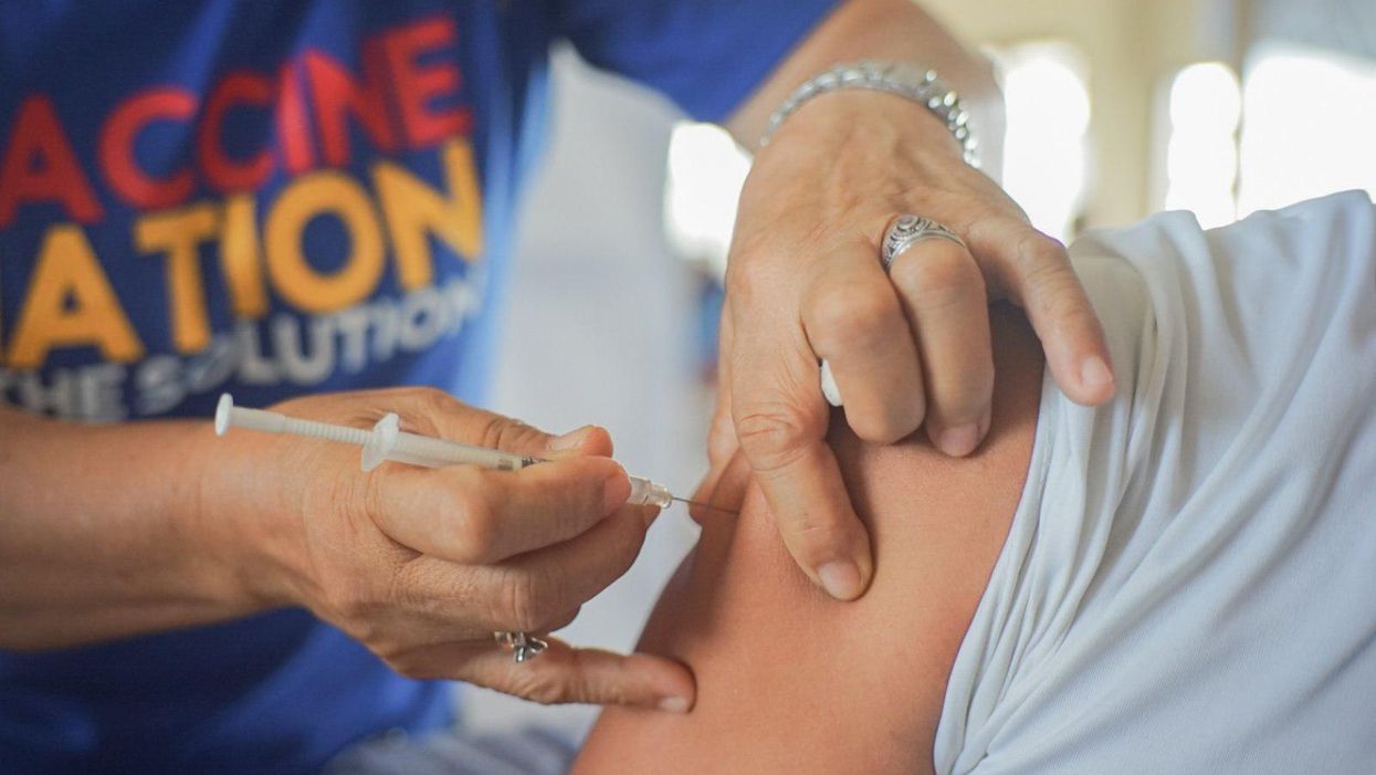 Patient receives COVID-19 vaccine.