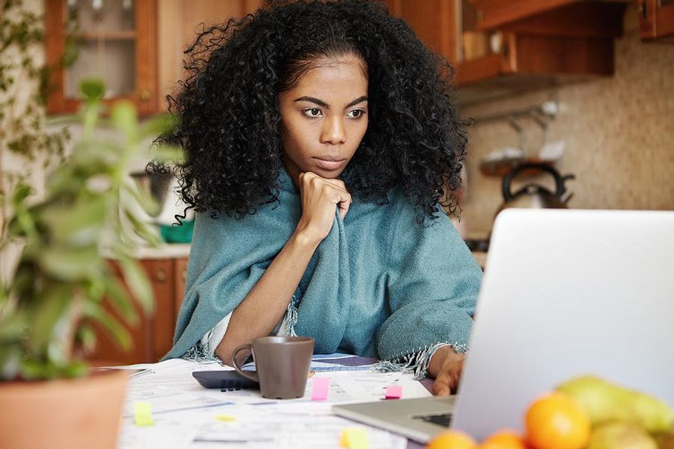 Woman manages her time her time while working and going to school