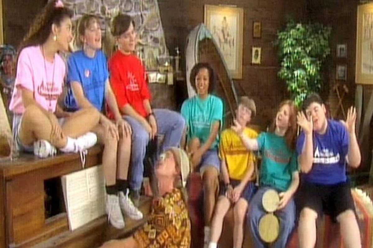 Kids at camp sitting around a piano, from the classic Nickelodeon show Salute Your Shorts