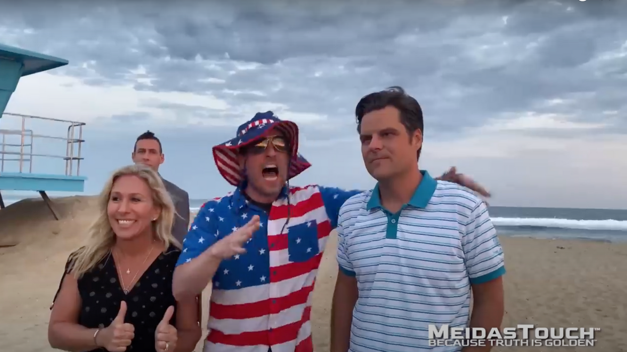 Comedian activist Walter Masterson, center, with Reps. Matt Gaetz, right, and Marjorie Taylor Greene.