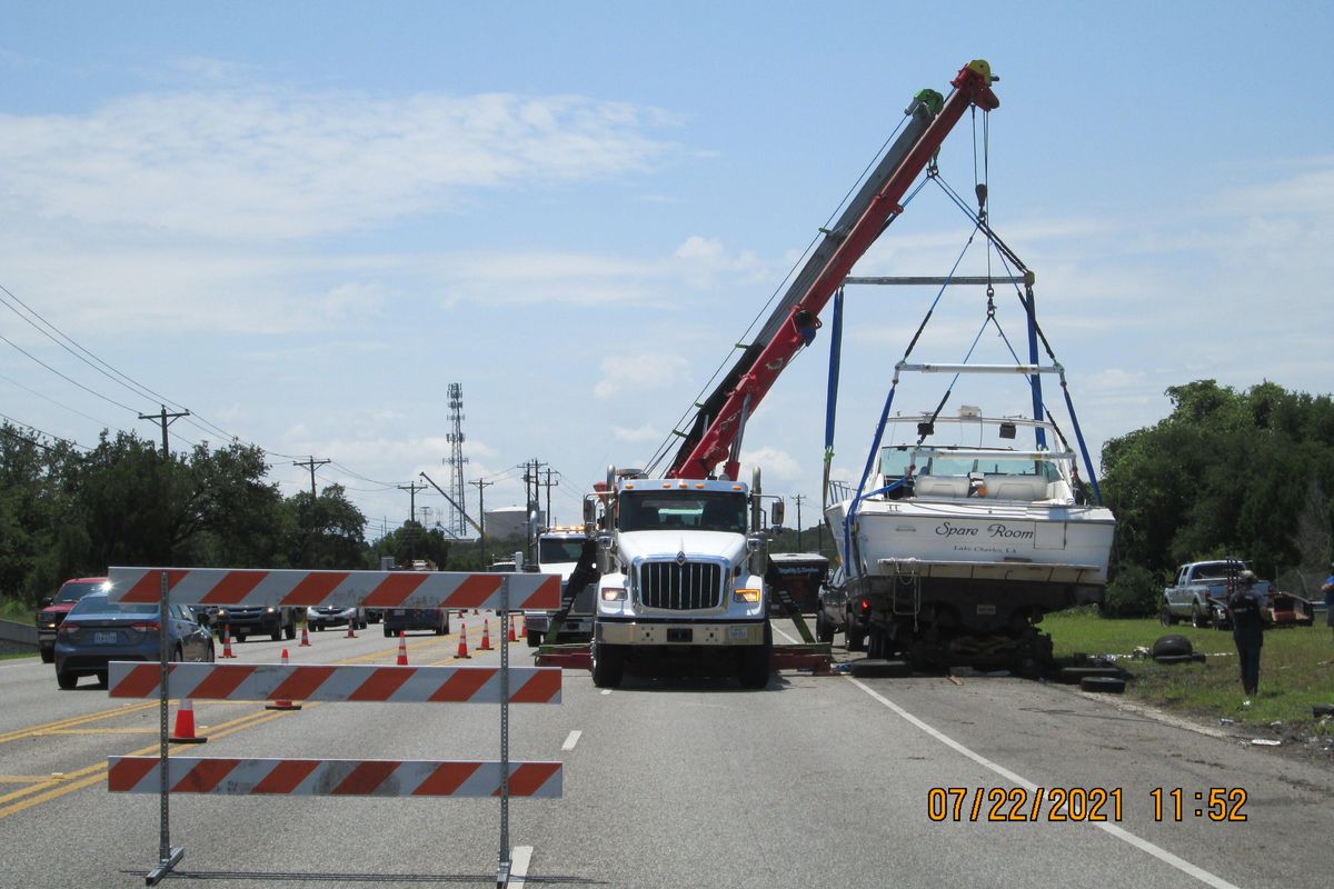 After 11 days ashore, 41-foot boat is removed from side of Bee Cave highway