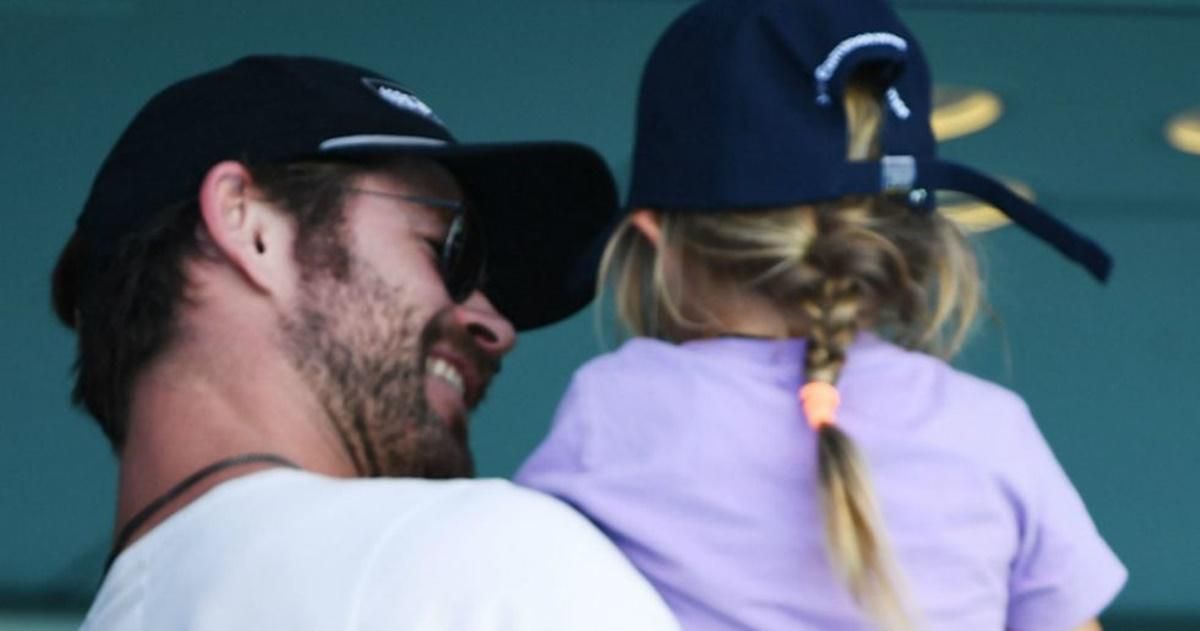 Chris Hemsworth holds daughter