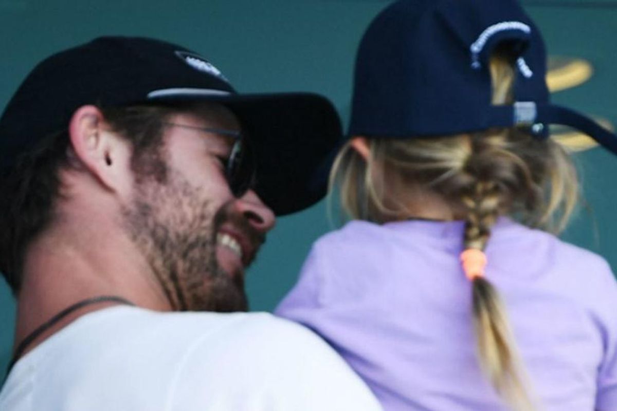 Chris Hemsworth holds daughter