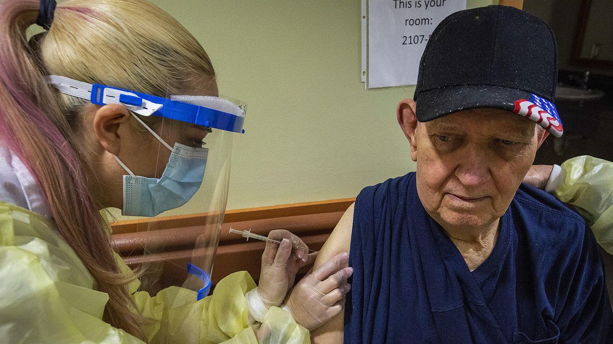 Patient receives COVID-19 vaccine