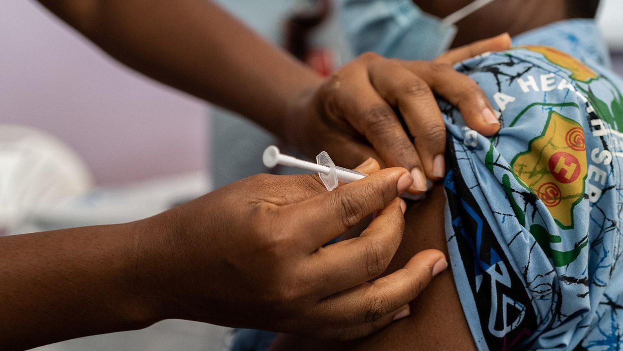 Patient receives COVID-19 vaccine in Ghana.
