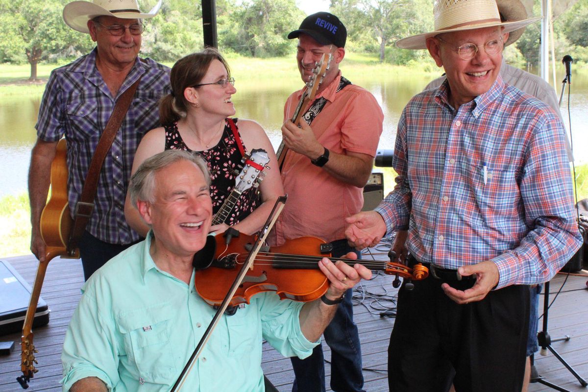Texas GOP Gov. Greg Abbott Literally Fiddling While COVID-19 Burns Through State