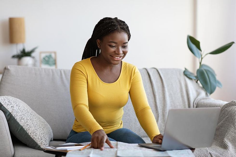 Woman looks at bullet points on her resume