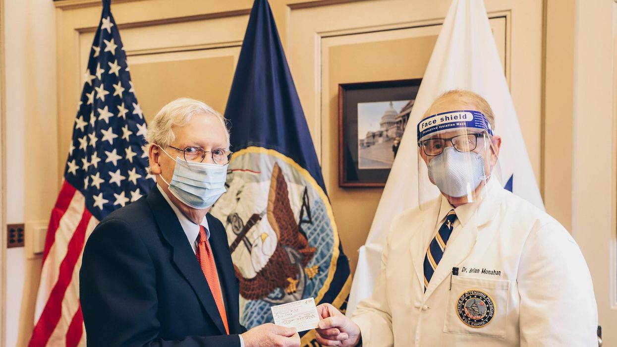 Senate Minority Leader Mitch McConnell receives the COVID-19 vaccine. 