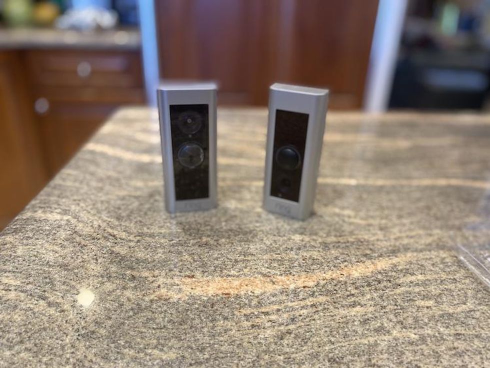 Ring Video Doorbell Pro 2 and Pro on a countertop